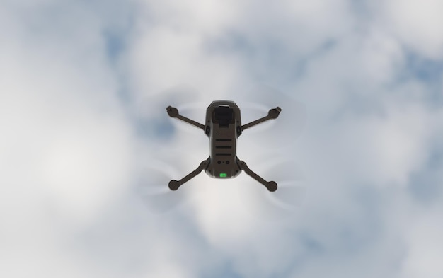 Lappeenranta Finland August 28 2022 DJI drone in flight Closeup bottom view against the background of clouds