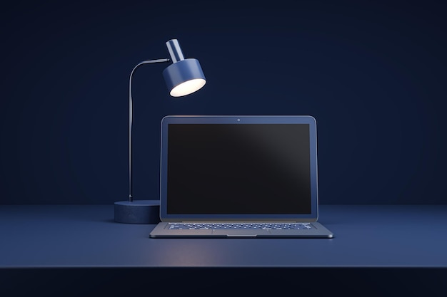 Photo laptop and desk lamp on a blue desk in a dark room 3d rendering