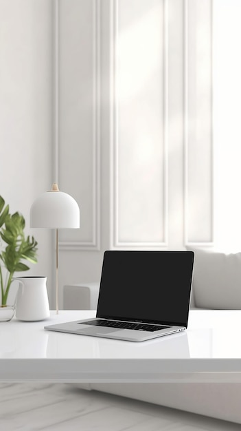 A laptop is open on a desk with a plant on the side.