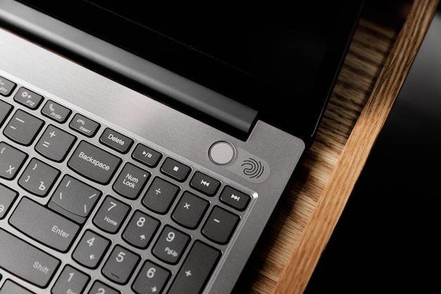 Laptop keyboard with fingerprint grey