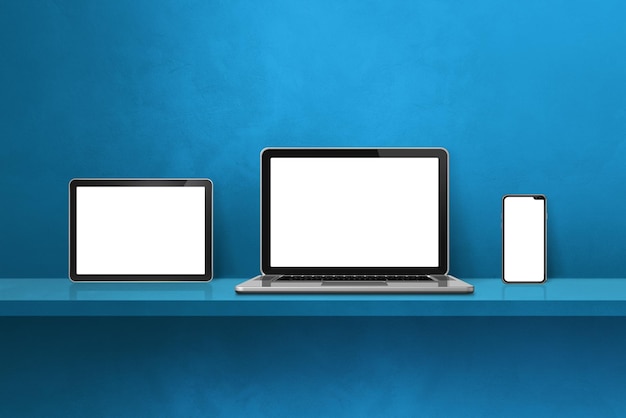 Laptop mobile phone and digital tablet pc on blue wall shelf Horizontal background