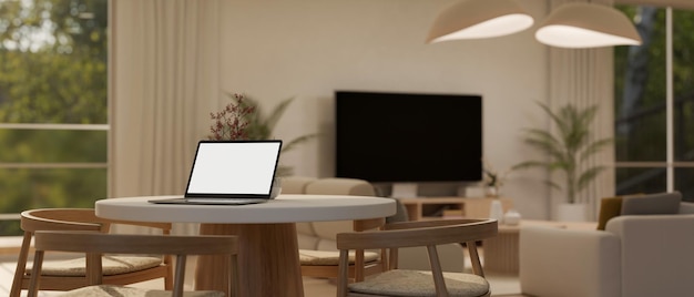 Laptop mockup on minimal dining table in comfortable and contemporary living room