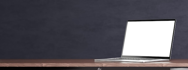 Laptop mockup on wooden table dark grey wall Side view open modern laptop mockup Laptop with blank white screen mockup wide web banner 3d rendering