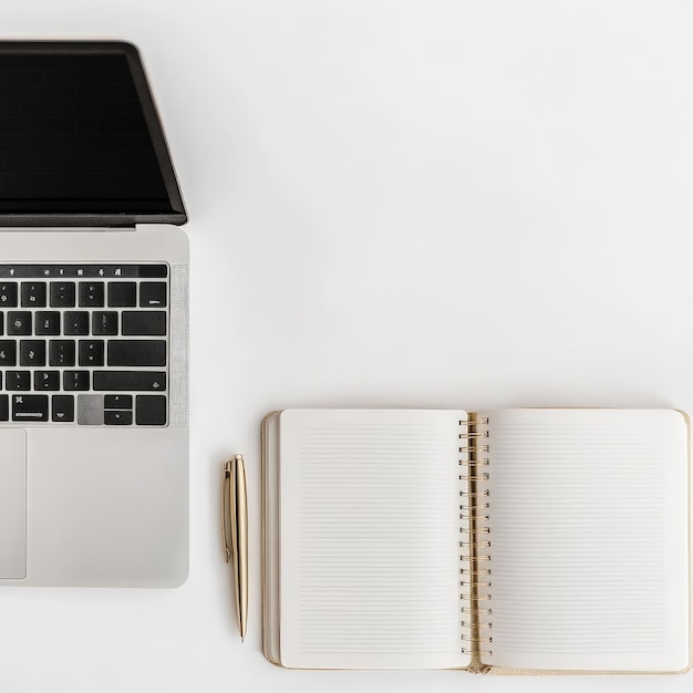 Laptop and Notebook on White Background with Copy Space