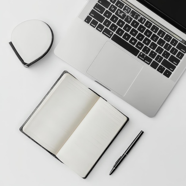 Laptop and Notebook on White Background with Copy Space