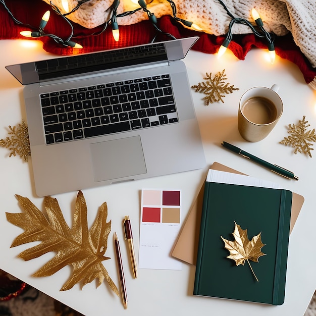 Photo a laptop and a notebook with a cup of coffee on a desk