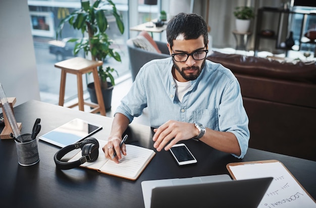 Laptop remote work and man doing research while working on a creative freelance project at his home Technology reading and male freelancer planning a business strategy on computer in living room