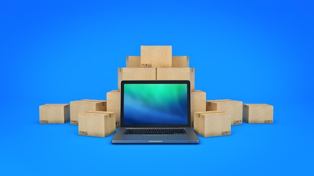 A laptop sits on top of a stack of cardboard boxes.