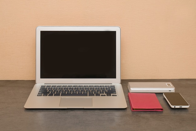 Laptop, smartphone and notepad. Workplace.