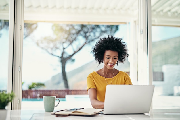 Laptop smile and relax with black woman and research for planning website and remote worker Blog networking and social media with female freelancer at home for email technology and internet