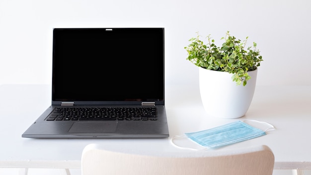 Laptop on white background and mask safe concept