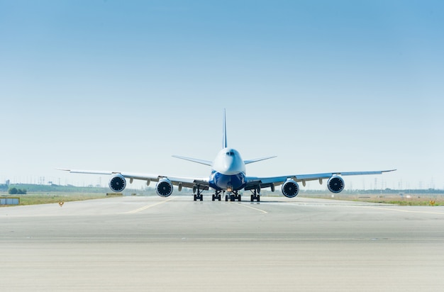 Large airplane on the runway ready for takeoff