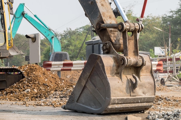 Large backhoe heavy dig soil stone