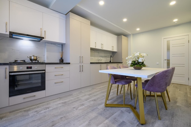 Large beige and cream luxury kitchen interior