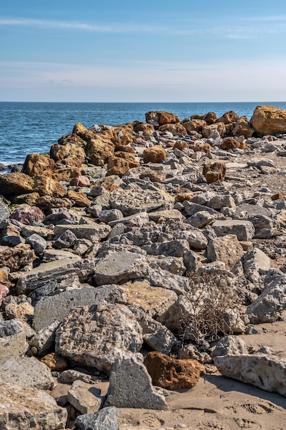 Large boulders of shell rock on the seashore