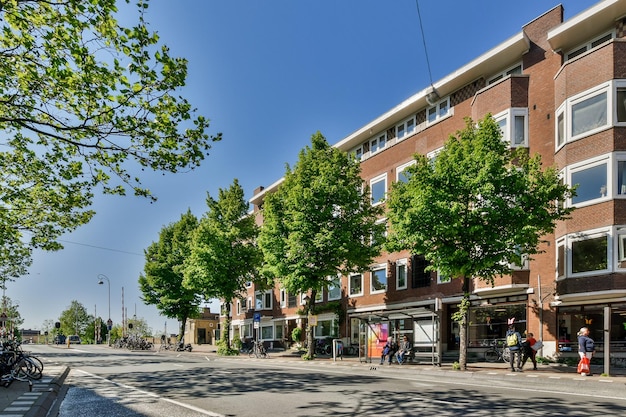 A large brick building with trees in front of it