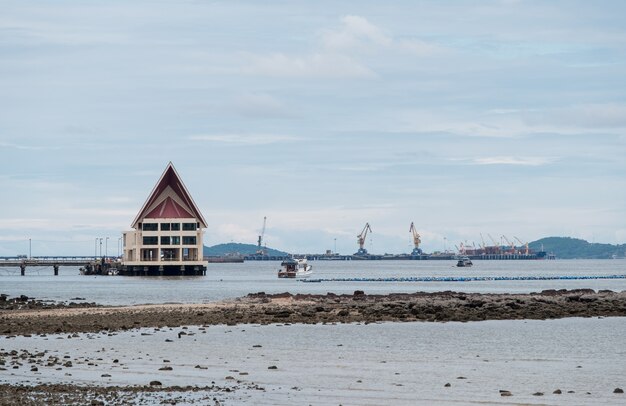 Large building of the passenger berths for tourists to the island near the commercial port in the eastern seaboard, Thailand.