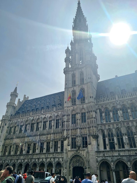 A large building with a flag on the front that says'bruges'on it