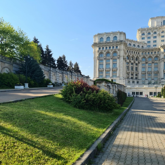 A large building with a large building in the background