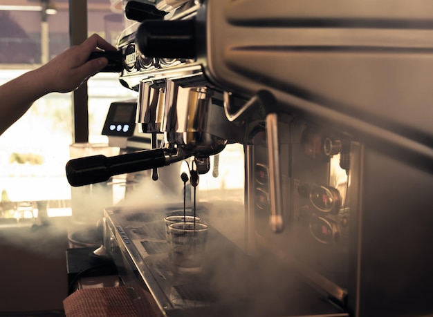 Large coffee maker two head elegant in coffee shop,dark brown tone