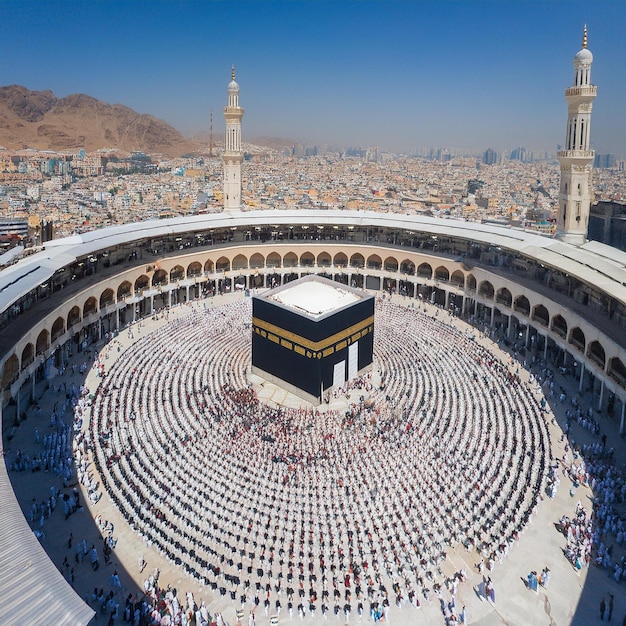 a large crowd of people are gathered around a mosque in the Kaaba at Makkah Saudi Arabia