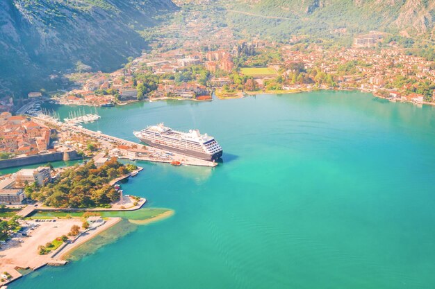 Large cruise liner in the port in the sunshine top view