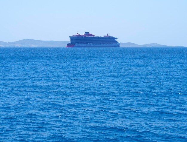 Large cruise liner in the sea port of Mykonos Island in Greece