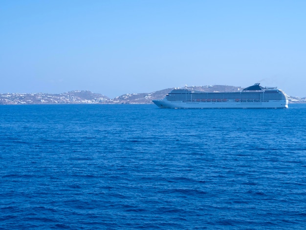 Large cruise liner in the sea port of Mykonos Island in Greece