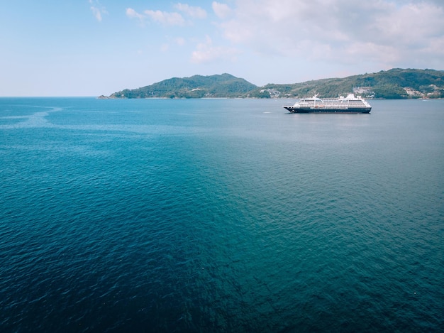 Large Cruise ship sailing across The Andaman sea - Aerial image. Beautiful  sea landscape