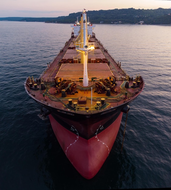 Large general cargo ship tanker bulk carrier aerial view at night