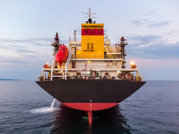 Large general cargo ship tanker bulk carrier aerial view at night