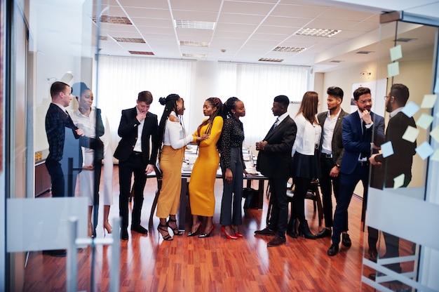 Large group of business people standing at office