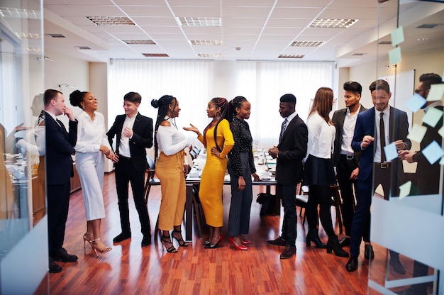 Large group of business people standing at office