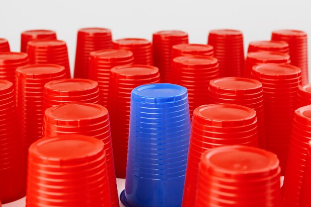 Large group of disposable plastic cups, red and blue