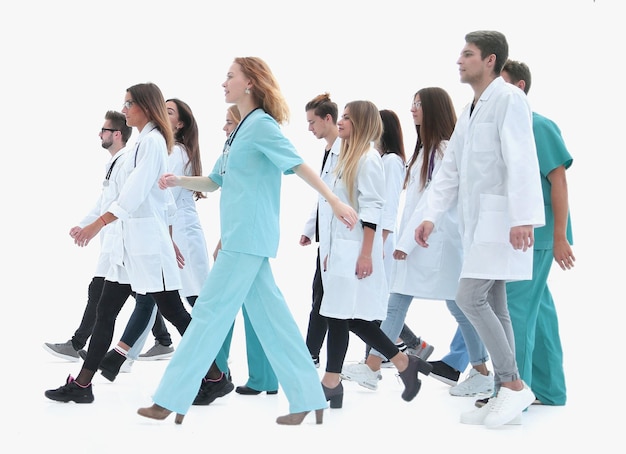 Large group of paramedics striding forward photo with copyspac