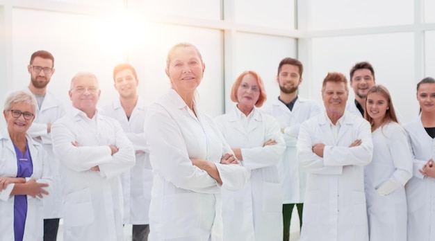 Large group of people in white coats standing together