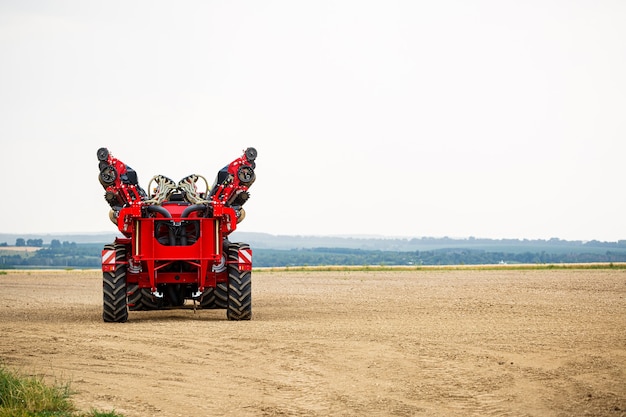 Large modern tractor for preparing the field after winter for sowing grain