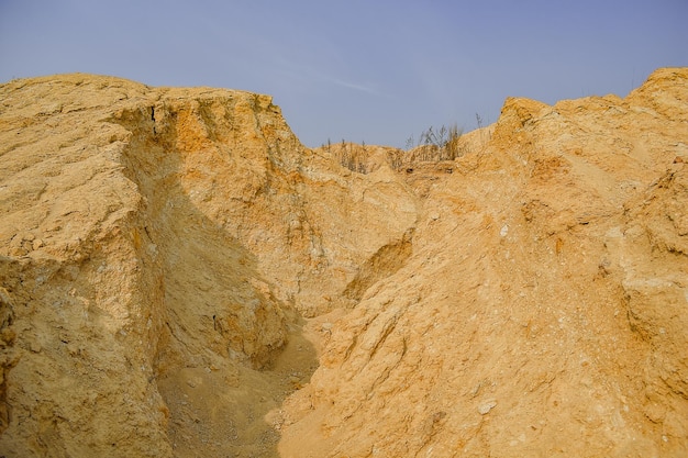 Large mountains of yellow sand Sand quarry Quarry sand mining