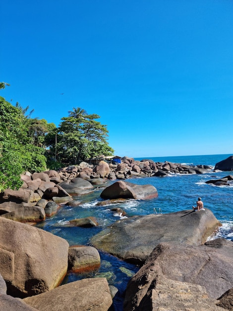 Large natural pool surrounded by stones