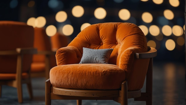 A large orange chair with a round cushion on top of it