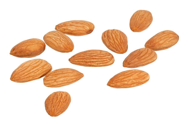 A large pile of almonds isolated on a white background High quality photo