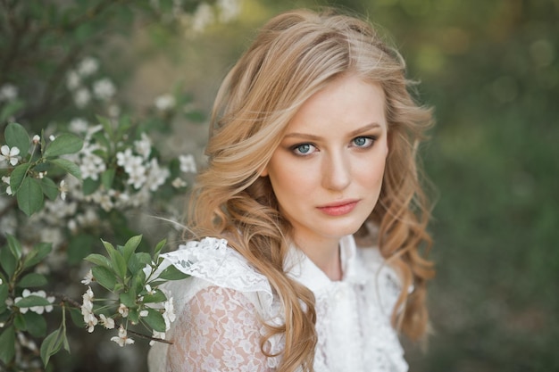 Large portrait of a beautiful girl in white flowers 2699