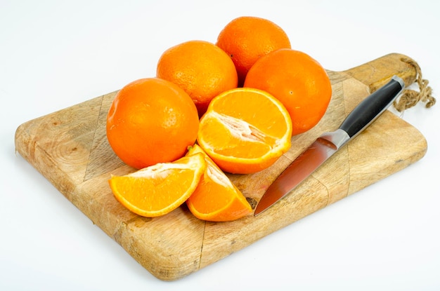 Large ripe sweet tangerines isolated on white background. Studio Photo