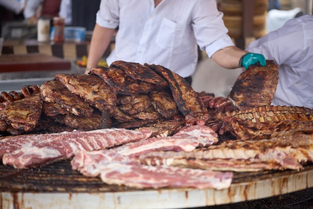 Large street roast meat stall at a popular festival