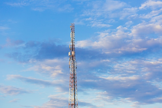 Large TV and radar antenna with 5G on a sky background