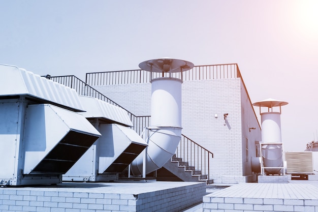 large ventilation system pipeline on building roof