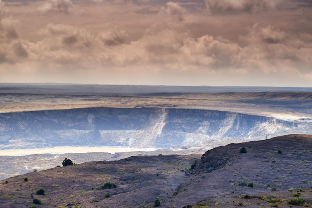 Large volcano in Mauna Loa Landscape of smoky mountain on Big Island Hawaii A dormant volcano in open secluded area Overcast sky with steaming volcanic area and a crater