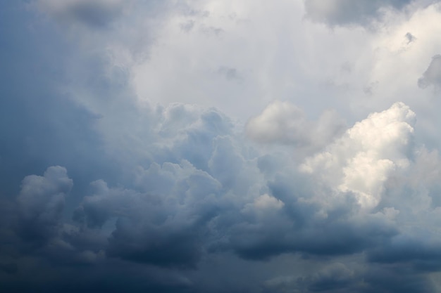 A large white cumulus cloud before the storm is approaching Heavy cloudy Clouds before thunderstorm Summer sky with curly white clouds