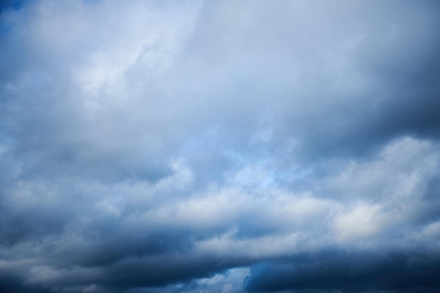 A large white cumulus cloud before the storm is approaching Heavy cloudy Clouds before thunderstorm Summer sky with curly white clouds