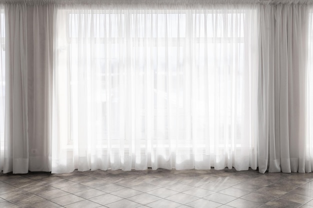 large window with transparent curtains to the floor bedroom interior conference room